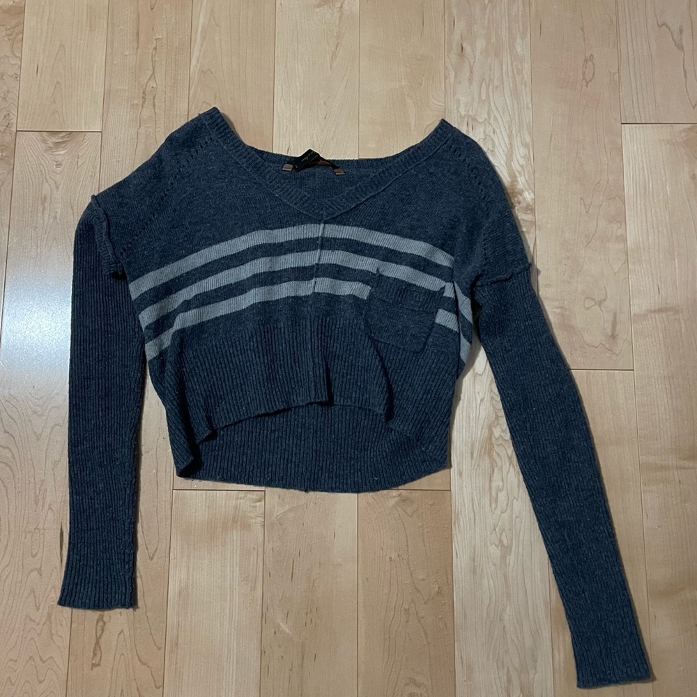 BCBG cropped sweater. True to size. Doesn’t fit me anymore.